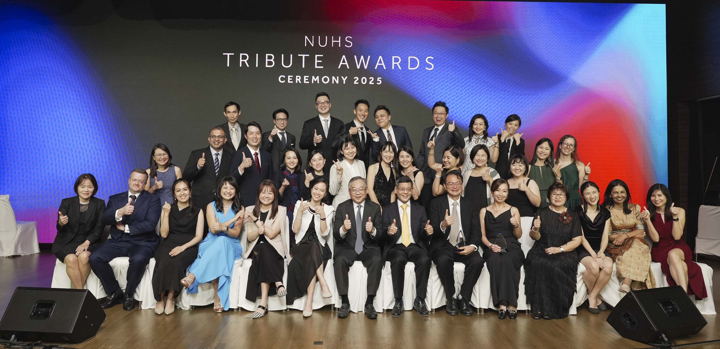 Excellence Award, Young Achiever Award and Team Award recipients with Deputy Prime Minister Mr Gan Kim Yong and NUHS Chief Executive Prof Yeoh Khay Guan