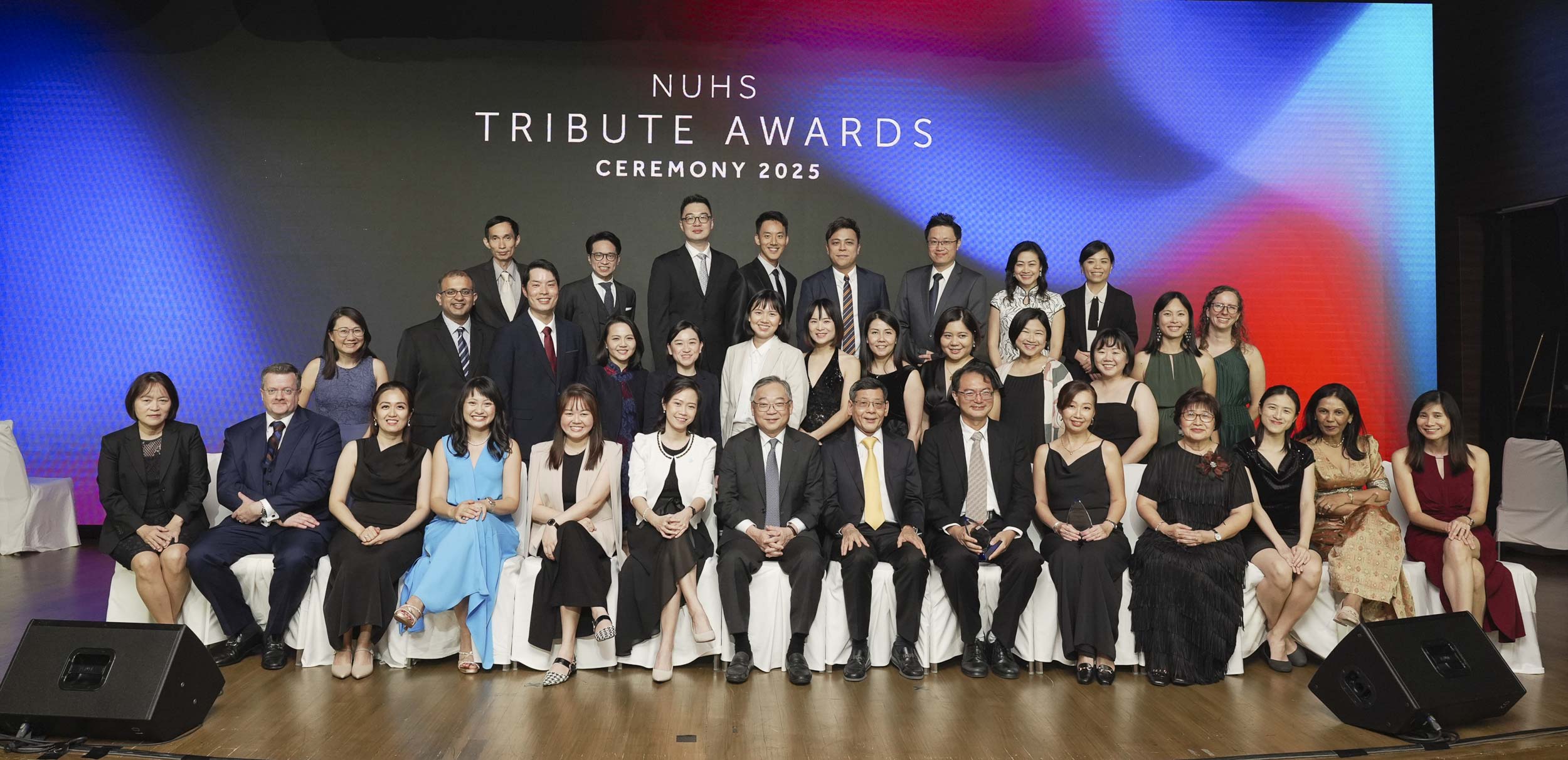 Excellence Award, Young Achiever Award and Team Award recipients with Deputy Prime Minister Mr Gan Kim Yong, NUHS Chief Executive Prof Yeoh Khay Guan